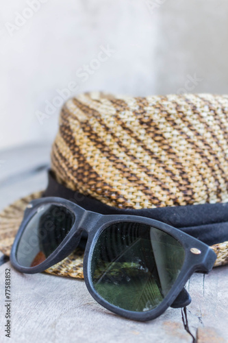 Sunglasses and a hat