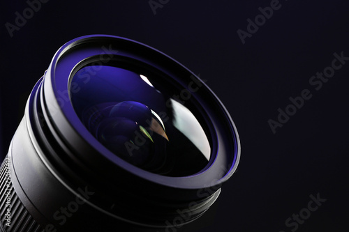 Camera lens on dark background