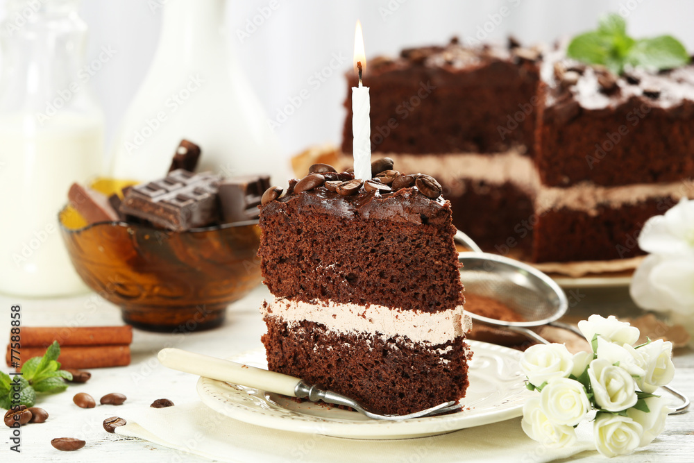 Delicious chocolate cake on table on light background Delicious chocolate cake on table on light background