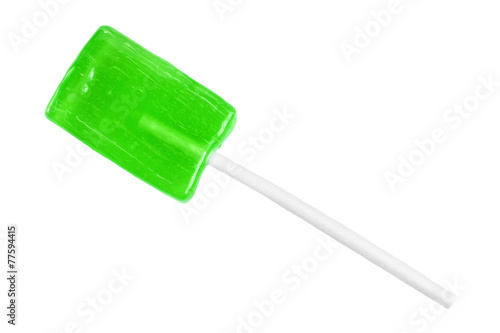 Green lollipop isolated on white background.