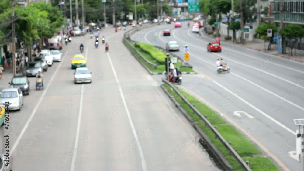 Traffic on road in Bangkok, Thailand. HD. Blurred background