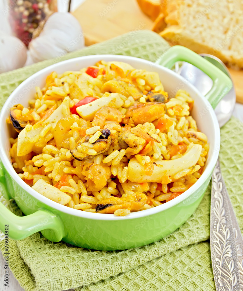 Pilaf with seafood and bread on napkin Pilaf with seafood and bread on napkin