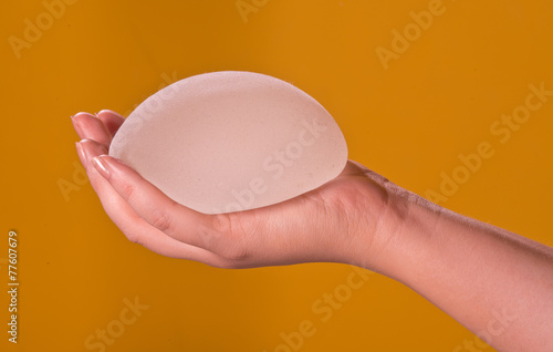 Obraz na płótnie Silicone implants on hand