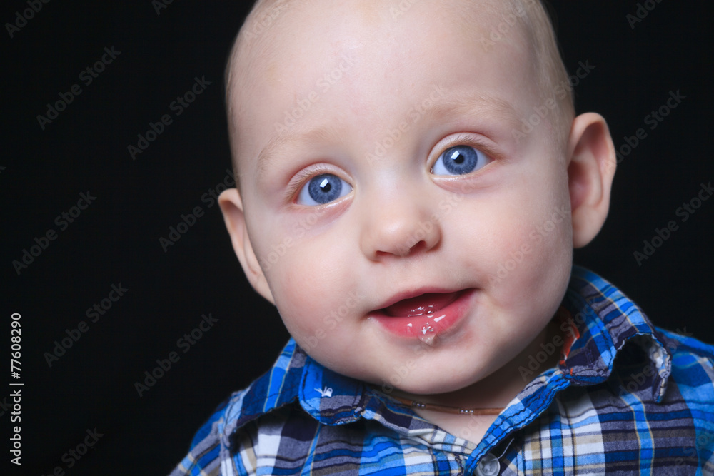 beautiful little boy portrait on dark background beautiful little boy portrait on dark background