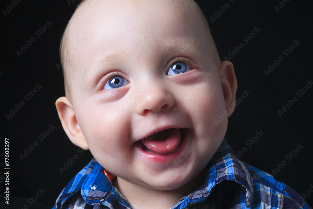 beautiful little boy portrait on dark background beautiful little boy portrait on dark background