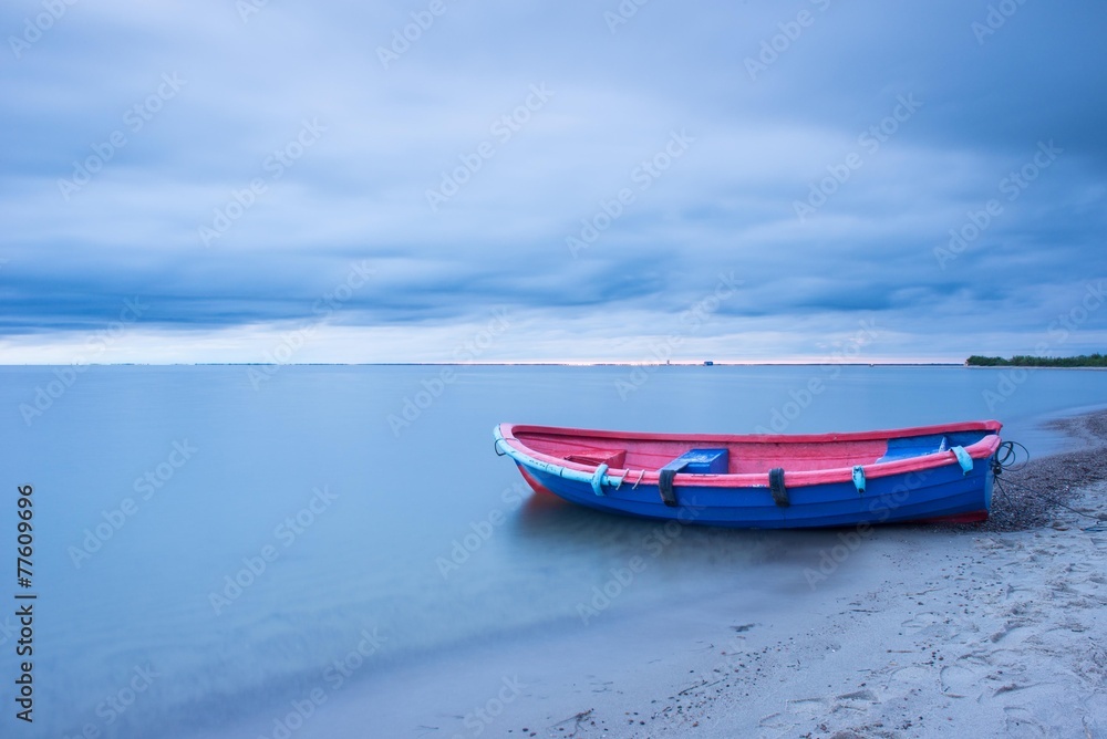 Fototapeta premium Vintage fishing boat during sunset