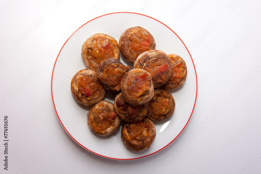 Mushrooms stuffed with fried vegetables Mushrooms stuffed with fried vegetables
