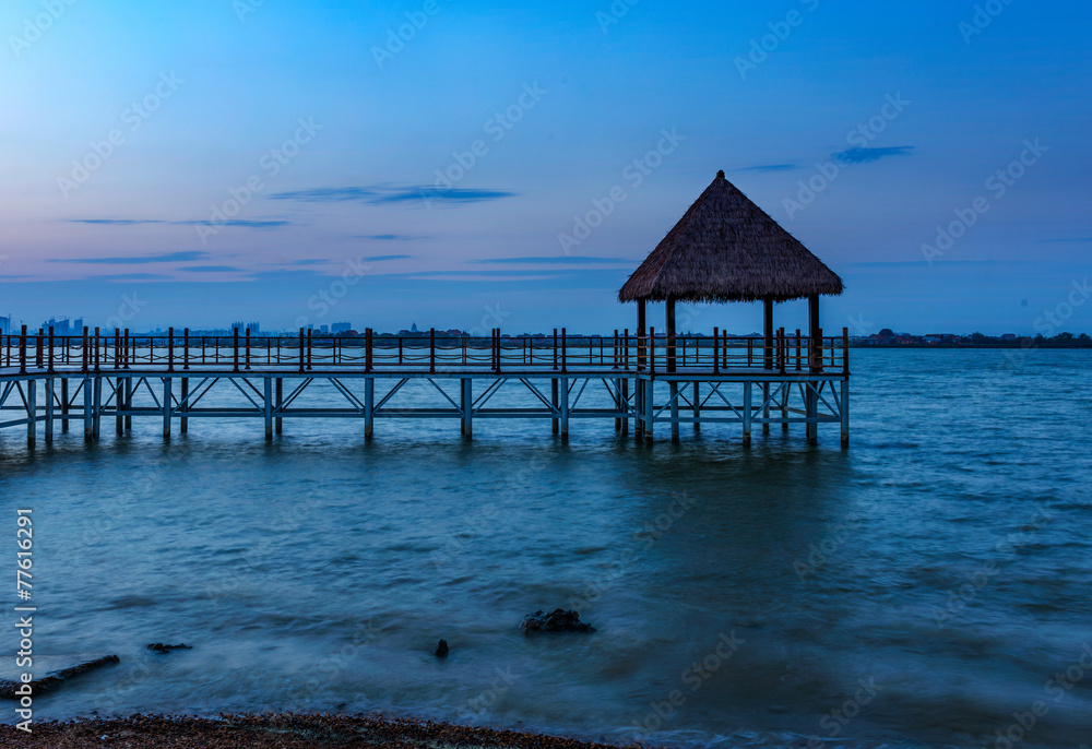 Wooden bridge to the tropical beach in the Thai's island