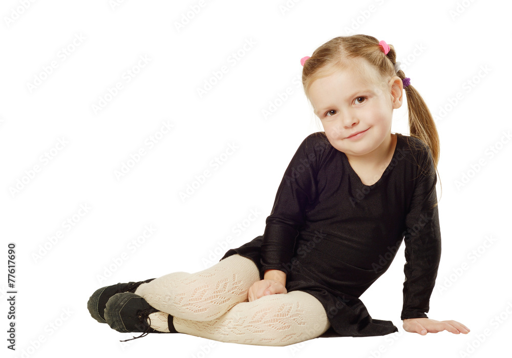 Little Girl dancer sits on White Background