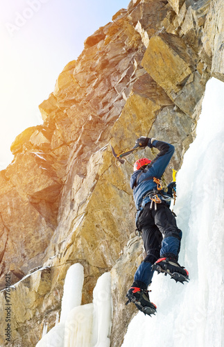 Ice climbing in winter mountains © Andrii Vergeles
