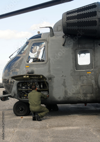 Navy pilot prepares for flight photo