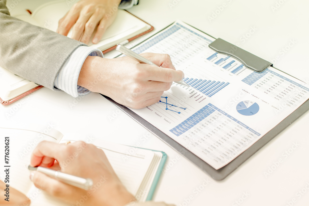 Business people discussing the charts and graphs showing the res