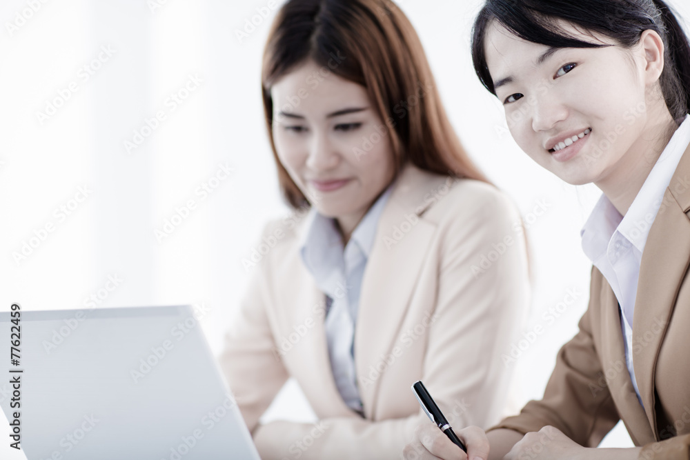 Business people discussing the charts and graphs showing the res Business people discussing the charts and graphs showing the res
