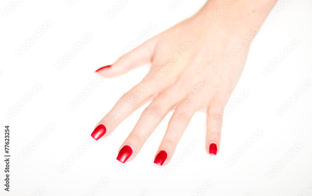 Woman hand with red nails, manicure concept Woman hand with red nails, manicure concept