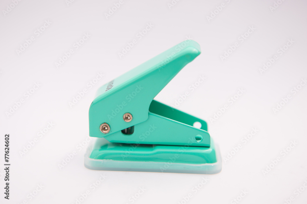 green paper punches isolate on white background green paper punches isolate on white background