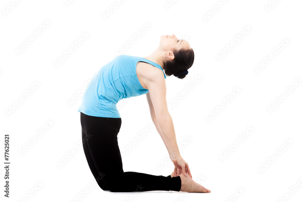 Yogi female in yoga asana Ustrasana
