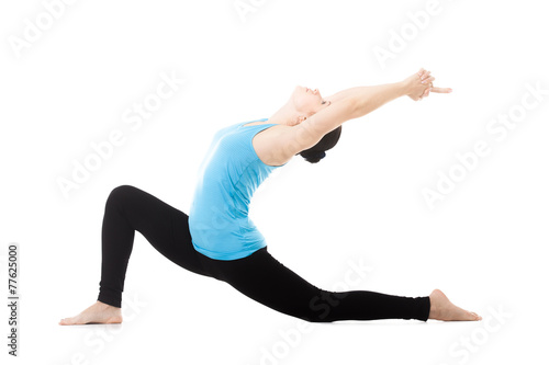 Yogi female in yoga asana Anjaneyasana