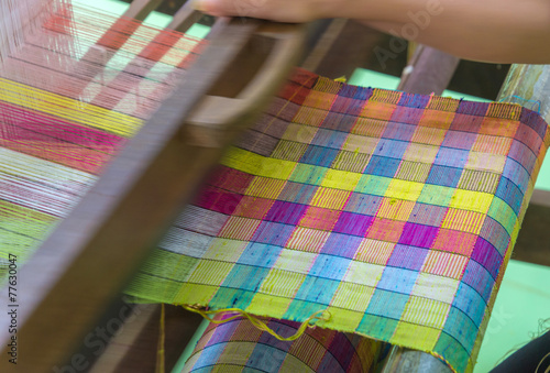 Obraz na płótnie Weaving loom and shuttle on the warp