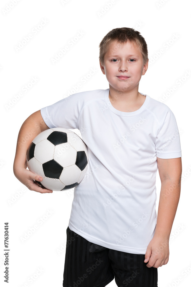 Confident young boy with soccer ball Confident young boy with soccer ball