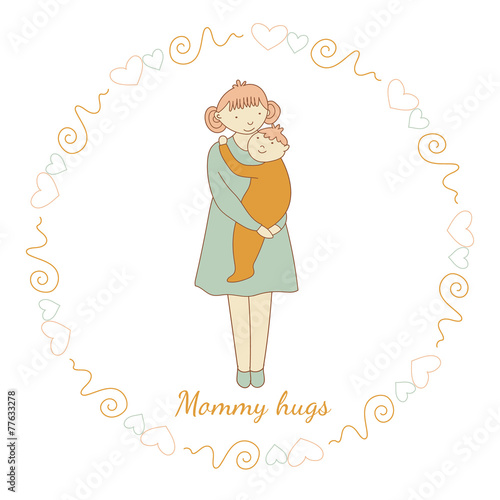 The mother holds the baby