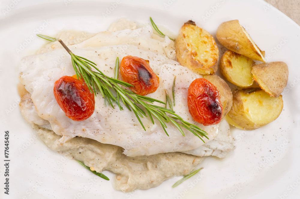 Fish dish - fish fillet in sauce and vegetables Fish dish - fish fillet in sauce and vegetables