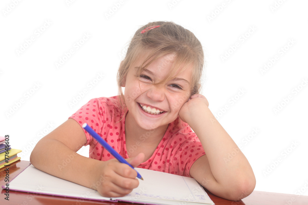 laughing little girl doing homework laughing little girl doing homework