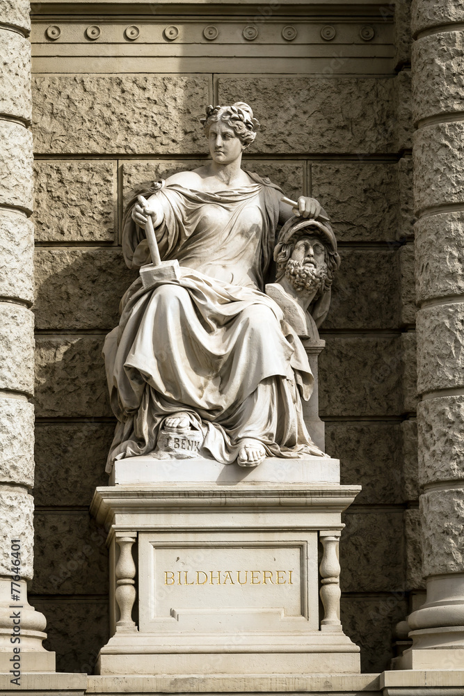 Stone sculpture of a woman in the the center of Vienna, Austria