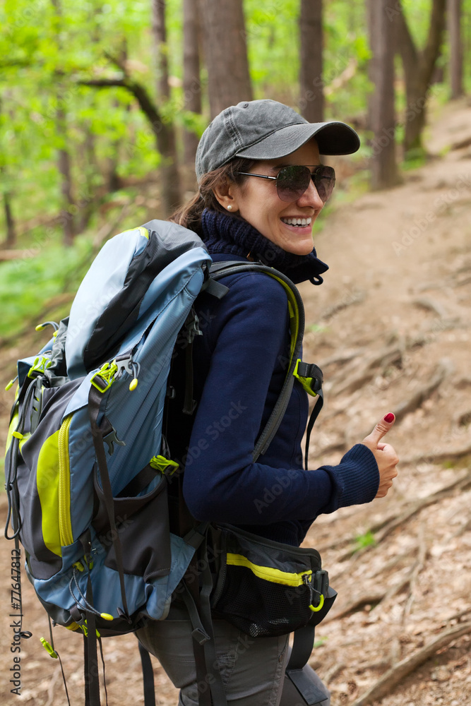Young female hiker with backpack
