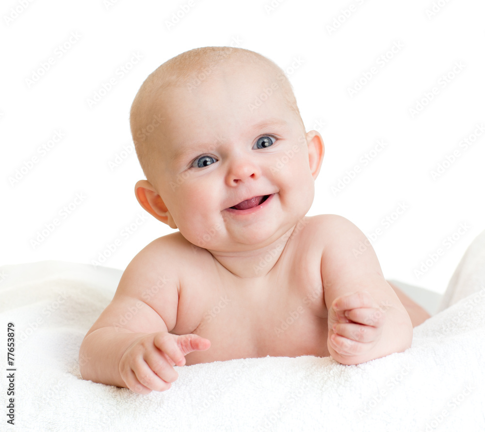 Cute smiling baby kid lying