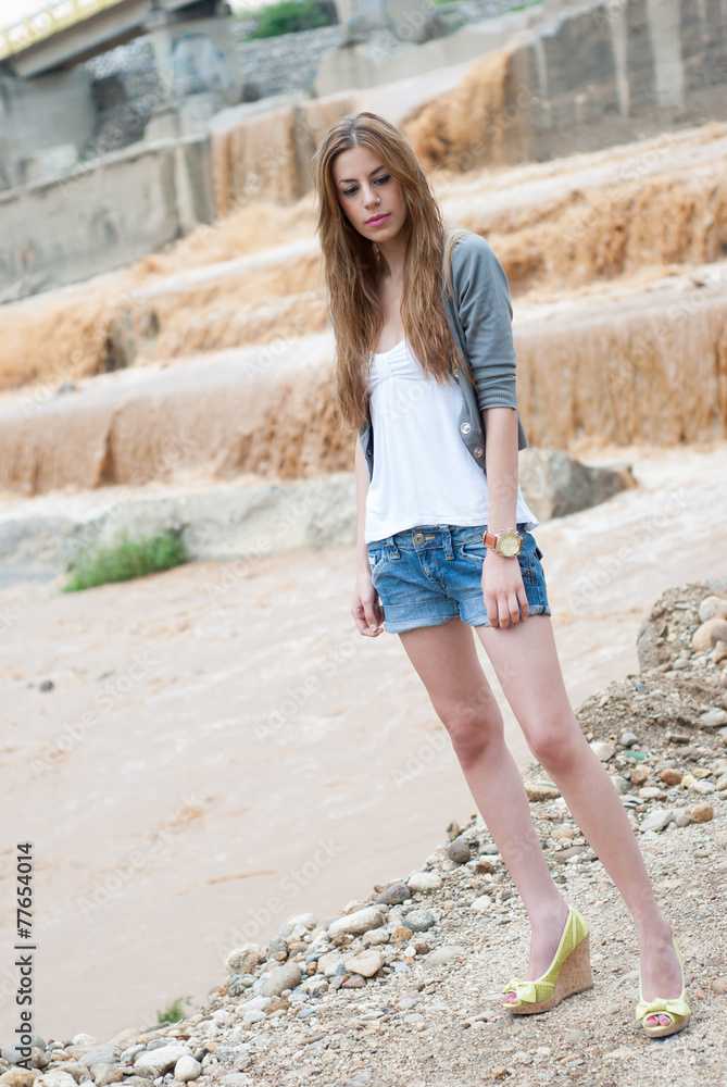 Casual, a river after strong rain as background