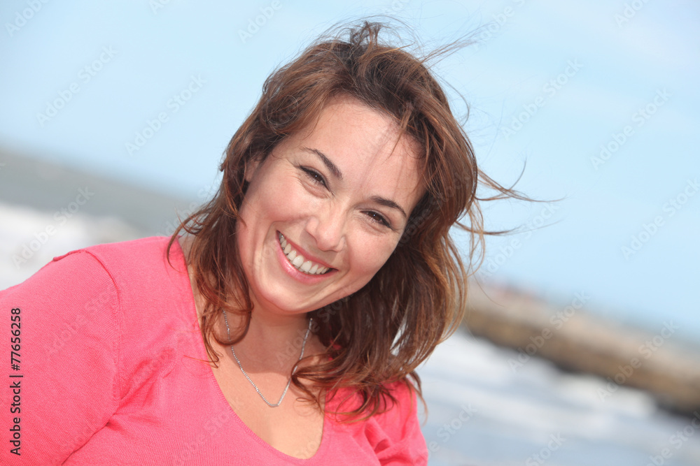 portrait of a happy beautiful woman outdoors