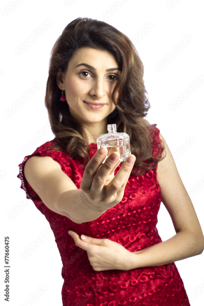 woman giving you her favorite perfum isolated over white backgro woman giving you her favorite perfum isolated over white backgro