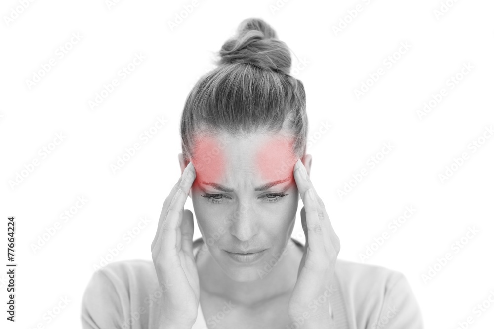 Woman with headache touching her temples Woman with headache touching her temples
