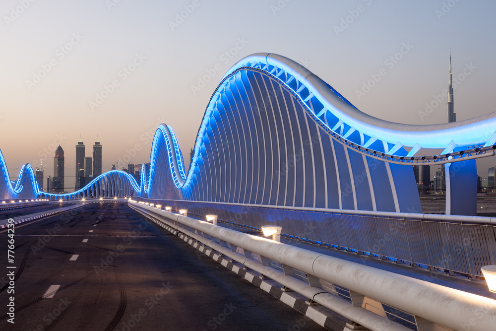 Meydan Bridge in Dubai at night. United Arab Emirates - obrazy, fototapety, plakaty 