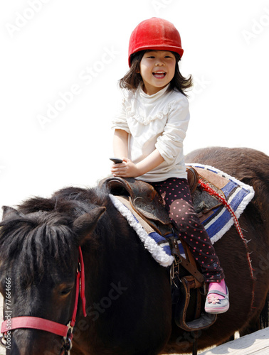 乗馬する女の子