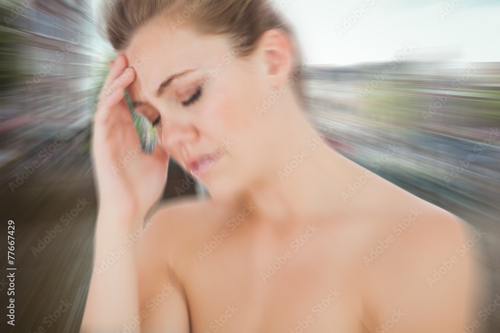 Fototapeta premium Composite image of woman with headache