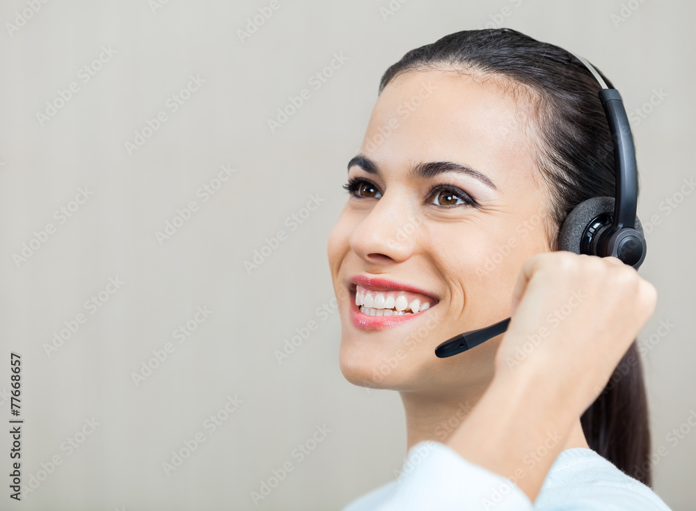 Customer Service Representative Talking On Headphones Customer Service Representative Talking On Headphones