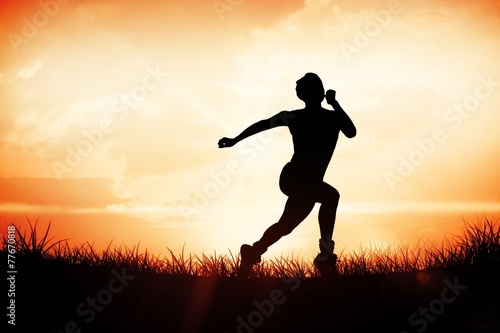 Composite image of fit brunette running and jumping © WavebreakmediaMicro