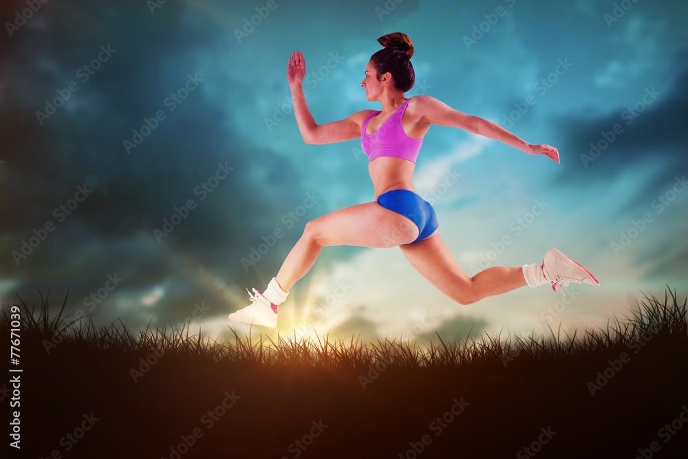Composite image of fit brunette running and jumping Composite image of fit brunette running and jumping