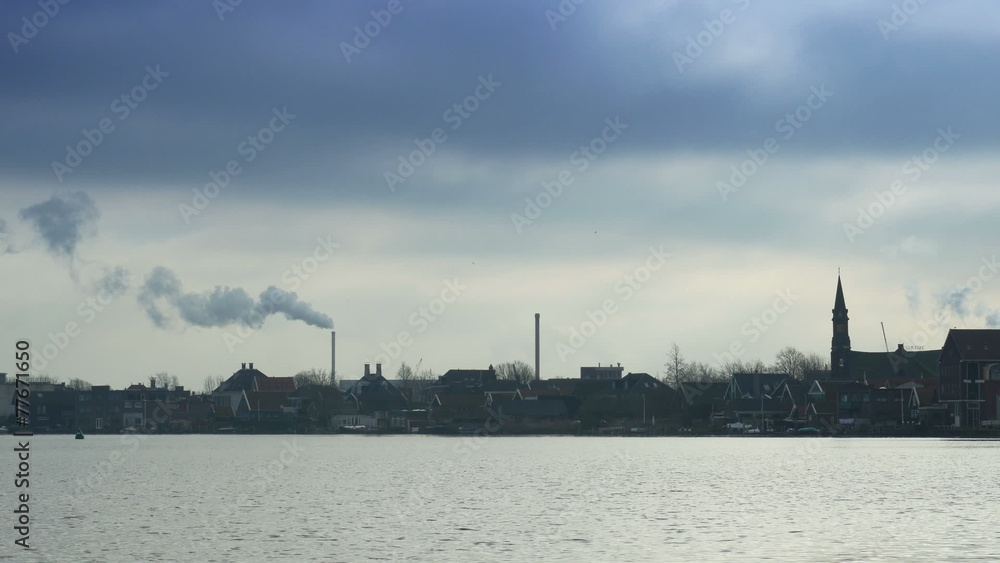 Dutch wooden houses and old industry near Amsterdam Dutch wooden houses and old industry near Amsterdam