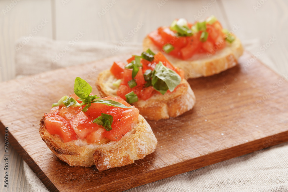 simple italian appetizing bruschetta with tomato and basil, on simple italian appetizing bruschetta with tomato and basil, on