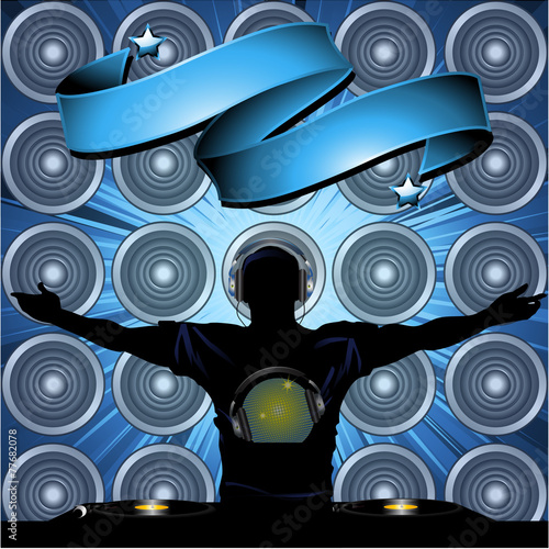 DJ and banner on wall speakers background
