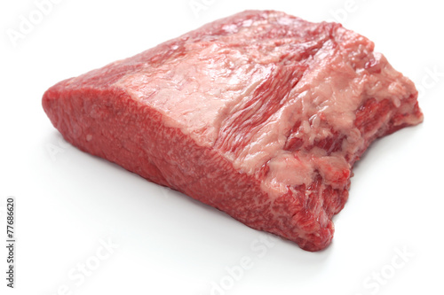 raw beef brisket isolated on white background photo