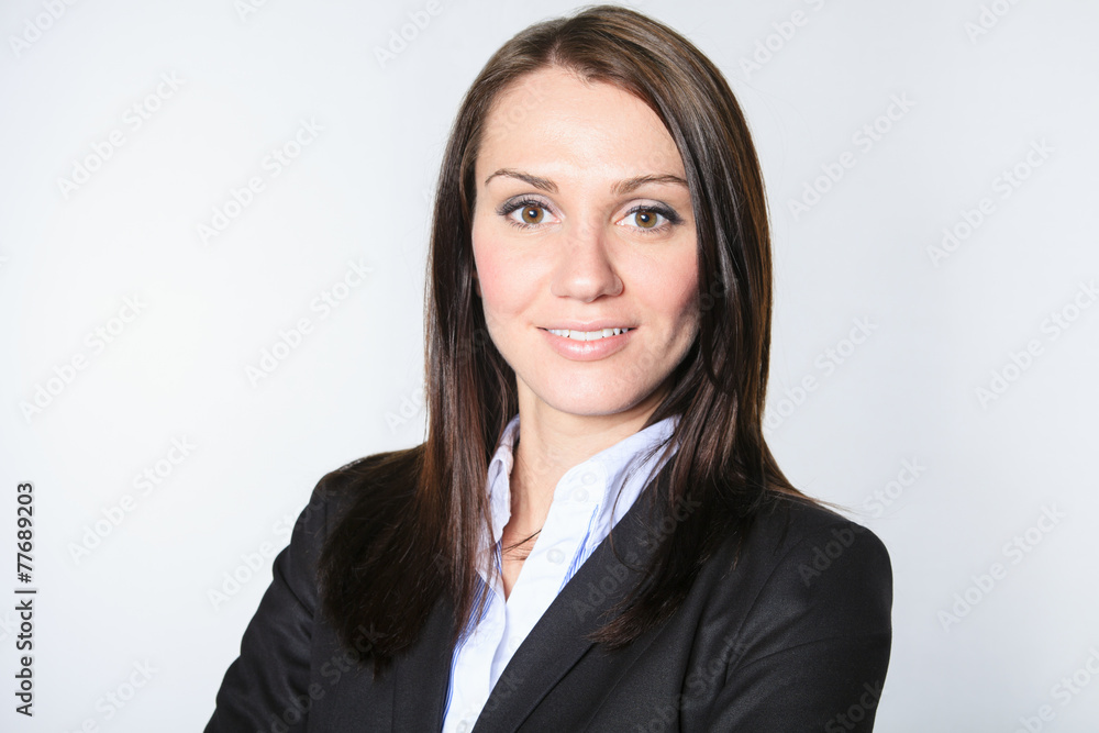 business woman in front of a gray background business woman in front of a gray background