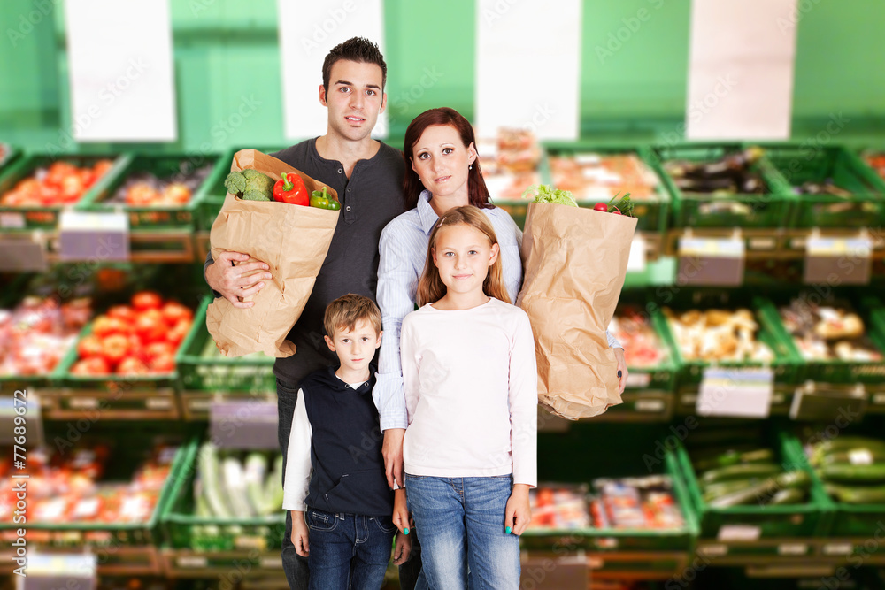 Family Shopping In Supermarket