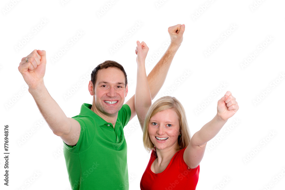 young couple with hands with arms up