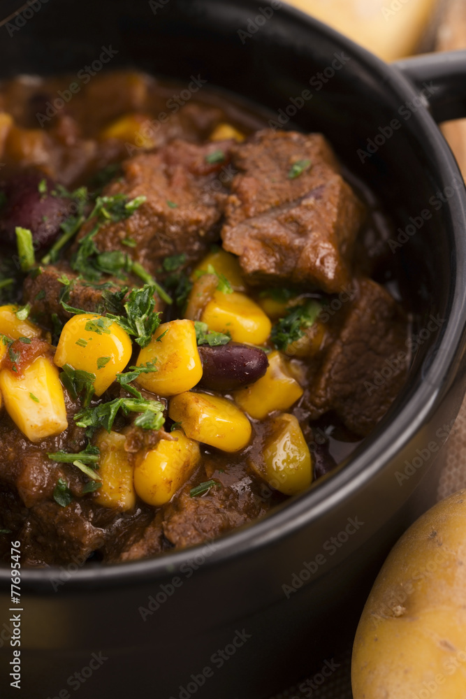 Tasty winter traditional hot pot stew with meat and vegetables Tasty winter traditional hot pot stew with meat and vegetables