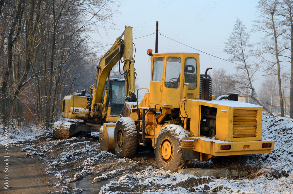 Excavator and bulldozer