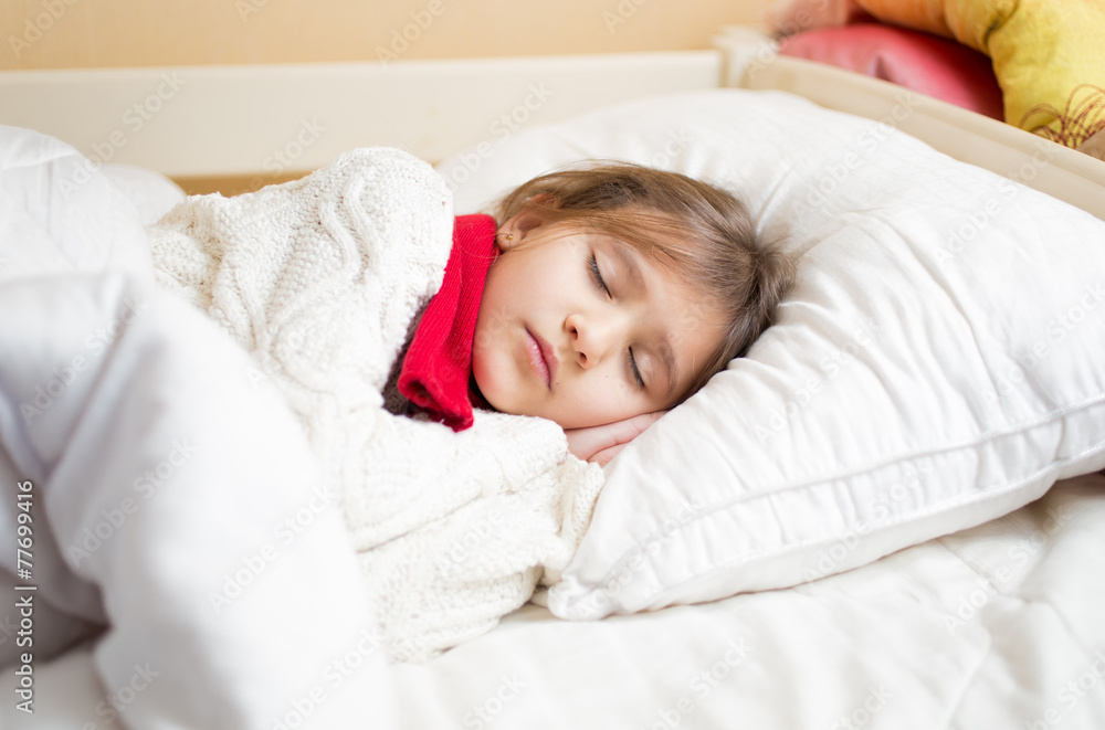 cute girl with cold sleeping under blanket cute girl with cold sleeping under blanket