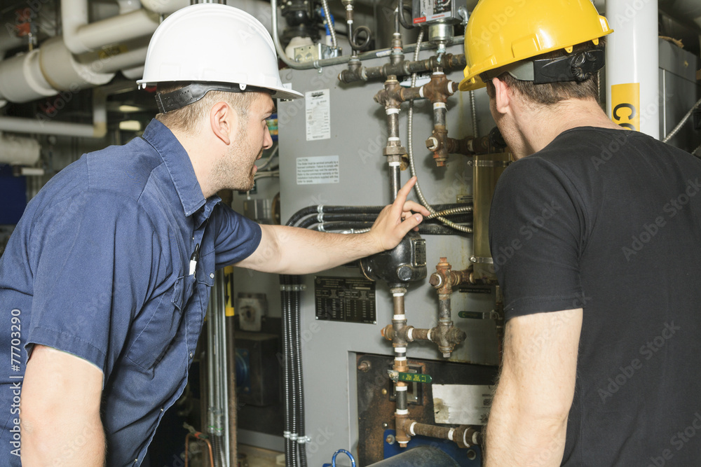 repairman engineer or inspector who check the system. repairman engineer or inspector who check the system.